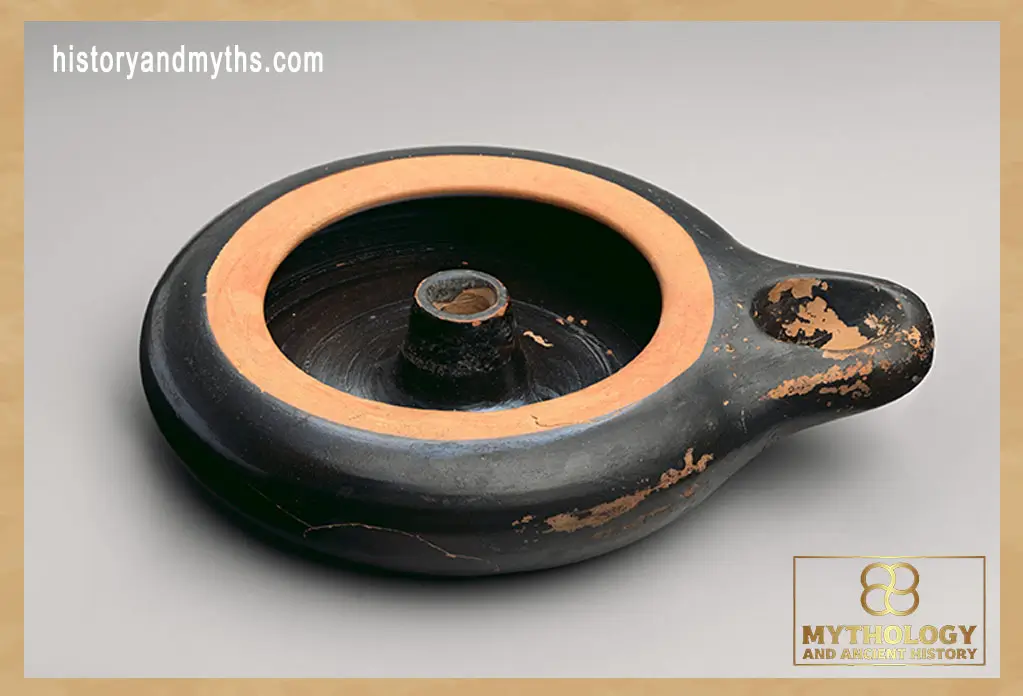 Terracotta oil lamp from Classical Greece, used for household lighting and nighttime movement inside Greek cities