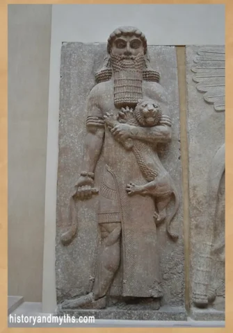 Assyrian relief depicting a heroic figure, commonly identified as Gilgamesh, mastering a lion (AO 19862)