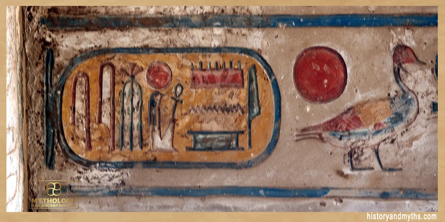 Painted cartouche and solar disk on the ceiling of the Great Hypostyle Hall in Karnak Temple, Luxor, showing hieroglyphic symbols associated with the sun god Ra