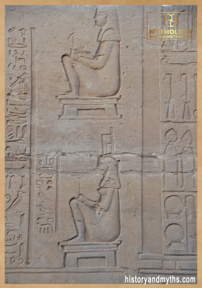 Wall relief from the Temple of Kom Ombo depicting two women seated on birthing stools with associated medical instruments