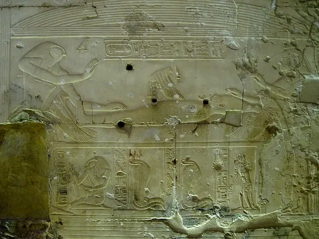 Relief of the raising of the god Osiris by the goddess Isis in the mortuary temple of Seti I in Abydos, Egypt