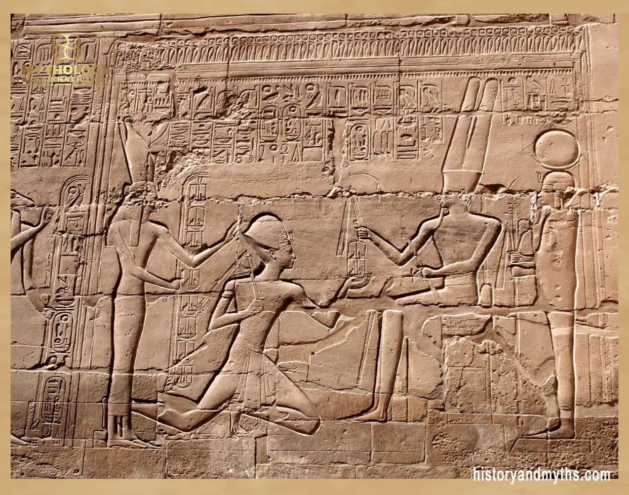 Stone relief depicting a pharaoh and queen carved into the walls of the Karnak temple complex