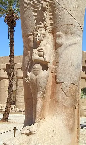 Statue of Princess Meritamen standing before her father, Ramesses II