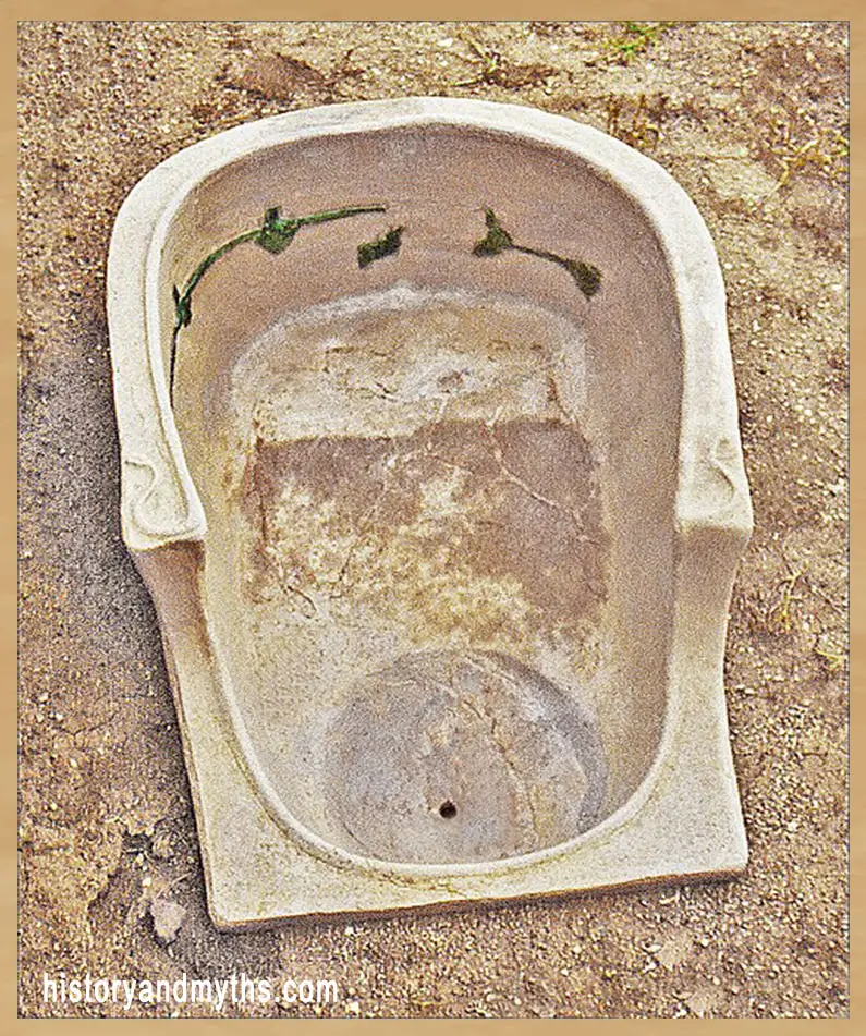 Terracotta bathtub from ancient Olynthus, reflecting household washing and water management practices in Classical Greek homes.