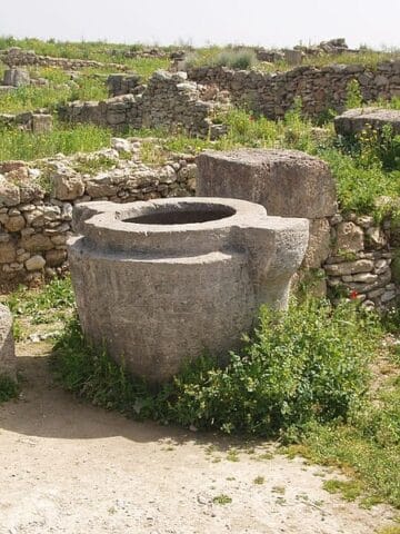Large-thick-walled-vessel-carved-out-of-stone