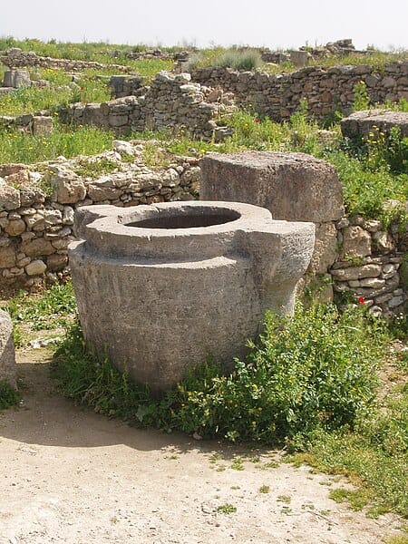 Large-thick-walled-vessel-carved-out-of-stone
