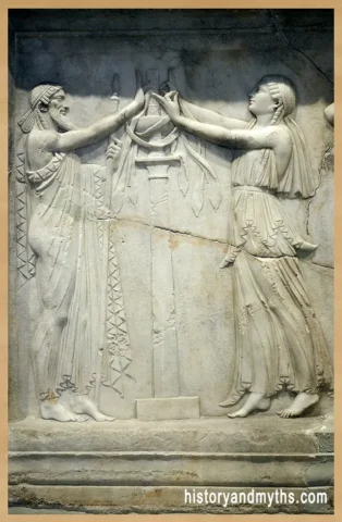 Priest and priestess in a ritual attitude, relief, 2nd century CE, Archaeological Museum of Piraeus