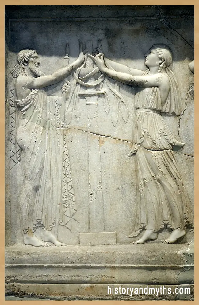 Priest and priestess in a ritual attitude, relief, 2nd century CE, Archaeological Museum of Piraeus
