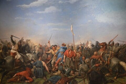 The Battle of Stamford Bridge (1870), painted by Peter Nicolai Arbo. Public domain, via Wikimedia Commons.