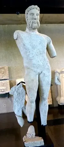 Fragmentary limestone statue interpreted as Jupiter-Taranis, discovered at Eymet in southwestern France and displayed at the Vesunna Museum in Périgueux.