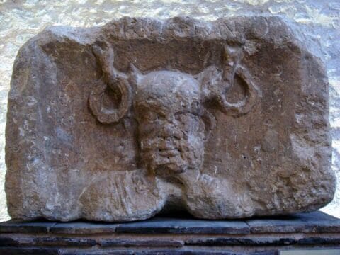 Cernunnos on the Pillar of the Boatmen, first century CE. Musée de Cluny, Paris. Photograph by PHGCOM, Public Domain, via Wikimedia Commons.