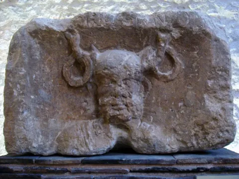 Cernunnos on the Pillar of the Boatmen, first century CE. Musée de Cluny, Paris. Photograph by PHGCOM, Public Domain, via Wikimedia Commons.