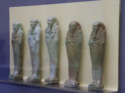 Ushabtis at Debrecen, photograph by HoremWeb, 28 December 2005. Licensed under CC BY-SA 4.0. Source: Wikimedia Commons.